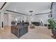 Inviting living area showcasing hardwood floors, designer touches, and seamless flow to the dining room and other living spaces at 109 Jodi Pl, Locust Grove, GA 30248