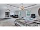 Expansive main bedroom featuring an elegant chandelier and sitting area at 109 Jodi Pl, Locust Grove, GA 30248
