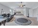 Open main bedroom area with sitting room and high ceilings and modern furnishings at 109 Jodi Pl, Locust Grove, GA 30248