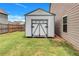 A well-maintained storage shed in the backyard, providing extra storage space at 109 Jodi Pl, Locust Grove, GA 30248