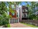 Modern townhomes with stylish exteriors, garages, balconies, and manicured landscaping at 167 Sampson Ne St, Atlanta, GA 30312