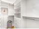 Organized walk-in closet with built-in shelves, drawers, and hanging rods at 167 Sampson Ne St, Atlanta, GA 30312