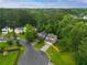Aerial view of the home's location on a tree-lined street in a suburban neighborhood at 2732 Dahlonega Trl, Austell, GA 30106