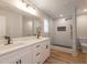 Bathroom with double sink vanity, modern fixtures, and a tiled walk-in shower at 2732 Dahlonega Trl, Austell, GA 30106