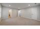 Bedroom with a door to the bathroom and a walk-in closet, neutral walls and plush carpeting at 2732 Dahlonega Trl, Austell, GA 30106