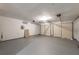 Spacious two-car garage featuring an epoxy floor at 2732 Dahlonega Trl, Austell, GA 30106