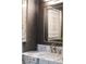 Elegant bathroom with marble countertop and contemporary lighting at 3286 Northside Nw Pkwy # Ph2, Atlanta, GA 30327