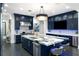 Kitchen with large island, stainless appliances, and bar stool seating at 3286 Northside Nw Pkwy # Ph2, Atlanta, GA 30327