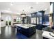 Open concept kitchen with marble island, stainless appliances, and access to a balcony at 3286 Northside Nw Pkwy # Ph2, Atlanta, GA 30327