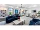 Open living space with bright light, built in shelving, and comfortable seating at 3286 Northside Nw Pkwy # Ph2, Atlanta, GA 30327