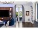 Elegant living room with dark wood floors, archway, and blue accents at 3286 Northside Nw Pkwy # Ph2, Atlanta, GA 30327