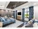 Luxurious bedroom with fireplace feature wall, decorative ceiling, and large windows at 3286 Northside Nw Pkwy # Ph2, Atlanta, GA 30327