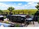 Al fresco dining area with outdoor furniture and city views in the background at 3286 Northside Nw Pkwy # Ph2, Atlanta, GA 30327