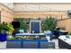 Charming rooftop patio with a grill, hot tub, outdoor seating, and manicured plants at 3286 Northside Nw Pkwy # Ph2, Atlanta, GA 30327