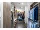 Large walk-in closet with custom storage solutions and a comfortable seating area at 3286 Northside Nw Pkwy # Ph2, Atlanta, GA 30327