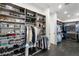 Well-organized walk-in closet featuring ample shelving and hanging space for clothes and shoes at 3286 Northside Nw Pkwy # Ph2, Atlanta, GA 30327