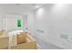 Bathroom with roughed in features, window, and open doorway to the bedroom at 4125 Ashwoody Ne Trl, Brookhaven, GA 30319