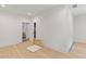 Bright bedroom with white walls and trim and views of the bathroom next door at 4125 Ashwoody Ne Trl, Brookhaven, GA 30319