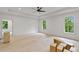 Bright, expansive primary bedroom with natural light and views, ready for finishing touches at 4125 Ashwoody Ne Trl, Brookhaven, GA 30319