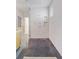 Modern walk-in shower featuring glass enclosure and tiled walls at 4125 Ashwoody Ne Trl, Brookhaven, GA 30319