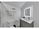 Bathroom with tiled walk-in shower, modern sink and mirror with under cabinet storage at 4222 Rickenbacker Ne Dr # 9, Atlanta, GA 30342