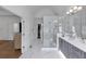 Spacious ensuite bathroom with glass enclosed shower and double sink vanity at 4222 Rickenbacker Ne Dr # 9, Atlanta, GA 30342