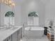 Serene bathroom features a soaking tub, double windows, and stylish fixtures for a spa-like experience at 4222 Rickenbacker Ne Dr # 9, Atlanta, GA 30342