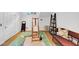 Multi-purpose bonus room with wood flooring, and an easel for art at 4222 Rickenbacker Ne Dr # 9, Atlanta, GA 30342