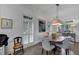 Dining room with hardwood floors, plantation shutters, and natural light at 4222 Rickenbacker Ne Dr # 9, Atlanta, GA 30342