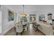 Bright dining room with hardwood floors, white walls, and stylish furniture at 4222 Rickenbacker Ne Dr # 9, Atlanta, GA 30342