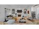 Spacious living room with fireplace, built-in shelving, and comfortable seating at 4222 Rickenbacker Ne Dr # 9, Atlanta, GA 30342