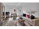 Comfortable den featuring a sofa, desk, statement mirror, and lots of natural light at 4222 Rickenbacker Ne Dr # 9, Atlanta, GA 30342