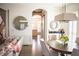 Bright and airy living room with hardwood floors, modern decor, and view into the kitchen at 4222 Rickenbacker Ne Dr # 9, Atlanta, GA 30342