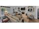 Bright living room with fireplace, built-in shelves, modern furnishings, and access to outdoor area at 4222 Rickenbacker Ne Dr # 9, Atlanta, GA 30342