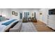 Spacious bedroom featuring hardwood floors, natural light, and sitting area with comfortable seating at 4222 Rickenbacker Ne Dr # 9, Atlanta, GA 30342