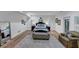 Spacious main bedroom with sitting area, hardwood floors, and lots of natural light at 4222 Rickenbacker Ne Dr # 9, Atlanta, GA 30342