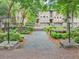Townhome community featuring beautiful landscaped gardens at 4222 Rickenbacker Ne Dr # 9, Atlanta, GA 30342