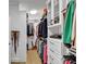 Spacious walk-in closet with custom shelving and ample storage for clothes and accessories at 4222 Rickenbacker Ne Dr # 9, Atlanta, GA 30342