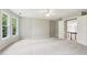 Spacious bedroom featuring neutral colors, plush carpeting and natural light at 4620 Springdale Ct, Cumming, GA 30041