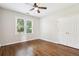 Bedroom with hardwood floors, bright window and large closet space at 4620 Springdale Ct, Cumming, GA 30041