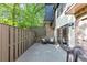 The deck features chairs and a wooden fence, perfect for outdoor living and entertaining at 2 Arpege Nw Way, Atlanta, GA 30327