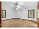 Large bedroom with two windows and neutral carpet, awaiting personalization at 3323 Silver Ridge Ct, Duluth, GA 30096