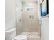 Modern bathroom with frameless shower and decorative mosaic tile accents at 4225 Wieuca Ne Rd, Atlanta, GA 30342