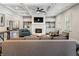 Bright living room with coffered ceilings, a marble fireplace, and built-in shelving for a cozy yet elegant feel at 4225 Wieuca Ne Rd, Atlanta, GA 30342