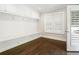 Practical mudroom featuring built-in benches, storage cabinets, and a door to the outside, offering style and convenience at 4225 Wieuca Ne Rd, Atlanta, GA 30342