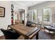 Spacious office with large windows with shutters, hardwood floors, and modern design at 4225 Wieuca Ne Rd, Atlanta, GA 30342