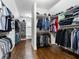 Spacious walk-in closet with custom shelving and ample storage space at 4225 Wieuca Ne Rd, Atlanta, GA 30342
