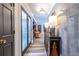 Inviting hallway featuring stylish decor, wood flooring, and natural light, perfect for a warm welcome at 4850 Lake Fjord Pass, Marietta, GA 30068