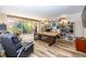 Spacious home office with a large wooden desk, built-in shelving, and large windows offering abundant natural light at 4850 Lake Fjord Pass, Marietta, GA 30068