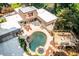 Aerial view of a home showcasing a luxurious pool, hot tub, spacious patio, and deck at 4850 Lake Fjord Pass, Marietta, GA 30068